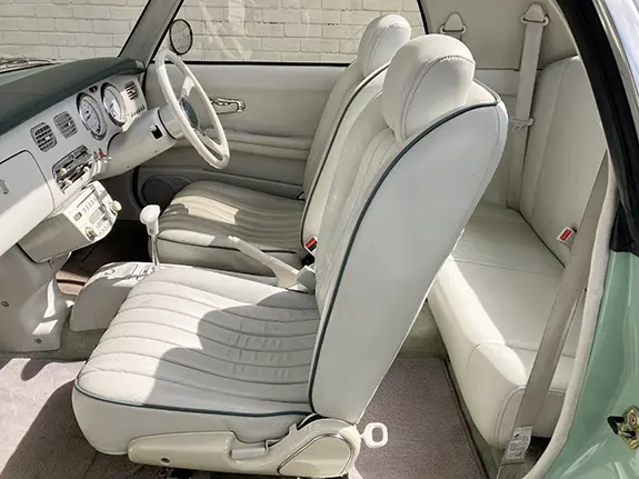 Nissan Figaro wedding car interior with front seat retained