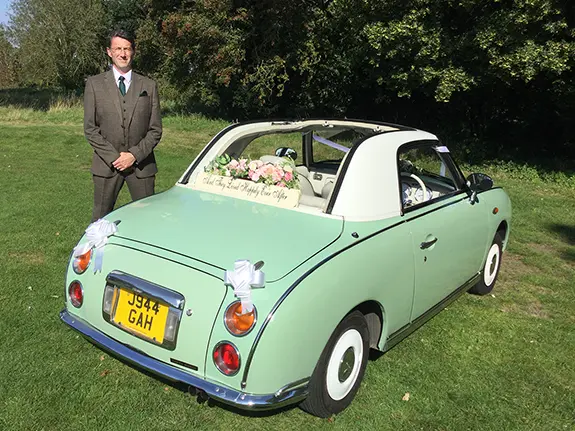 Florence the Nissan Figaro with chauffeur John for wedding hire